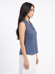 A smart dusty blue sleeveless top featuring a tailored lapel collar for a clean and contemporary look.