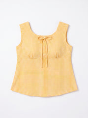 A yellow and white gingham sleeveless top with a scoop neckline, gathered bust, and a front tie detail, shown flat against a white background.