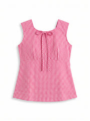 A woman modeling a sleeveless pink and white gingham top with a tie-neck detail, paired with dark gray jeans, against a plain white studio background.