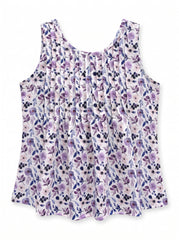 A sleeveless, scoop-neck top with a pleated texture and an all-over watercolor floral print in shades of purple, pink, and blue on a white background.