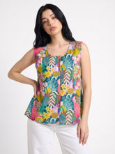 A vibrant teal sleeveless top featuring playful pink, yellow, green, and blue botanical motifs for a fresh statement look.