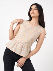 A fresh off-white sleeveless top featuring a soft pastel chevron print in peach, green, lavender, and yellow tones