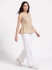 A fresh Multicolor sleeveless top featuring colorful geometric triangle motifs in blue, red, green, and orange tones.