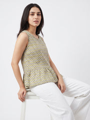 A stylish sleeveless top featuring a neat olive green and brown geometric print for a smart everyday look.