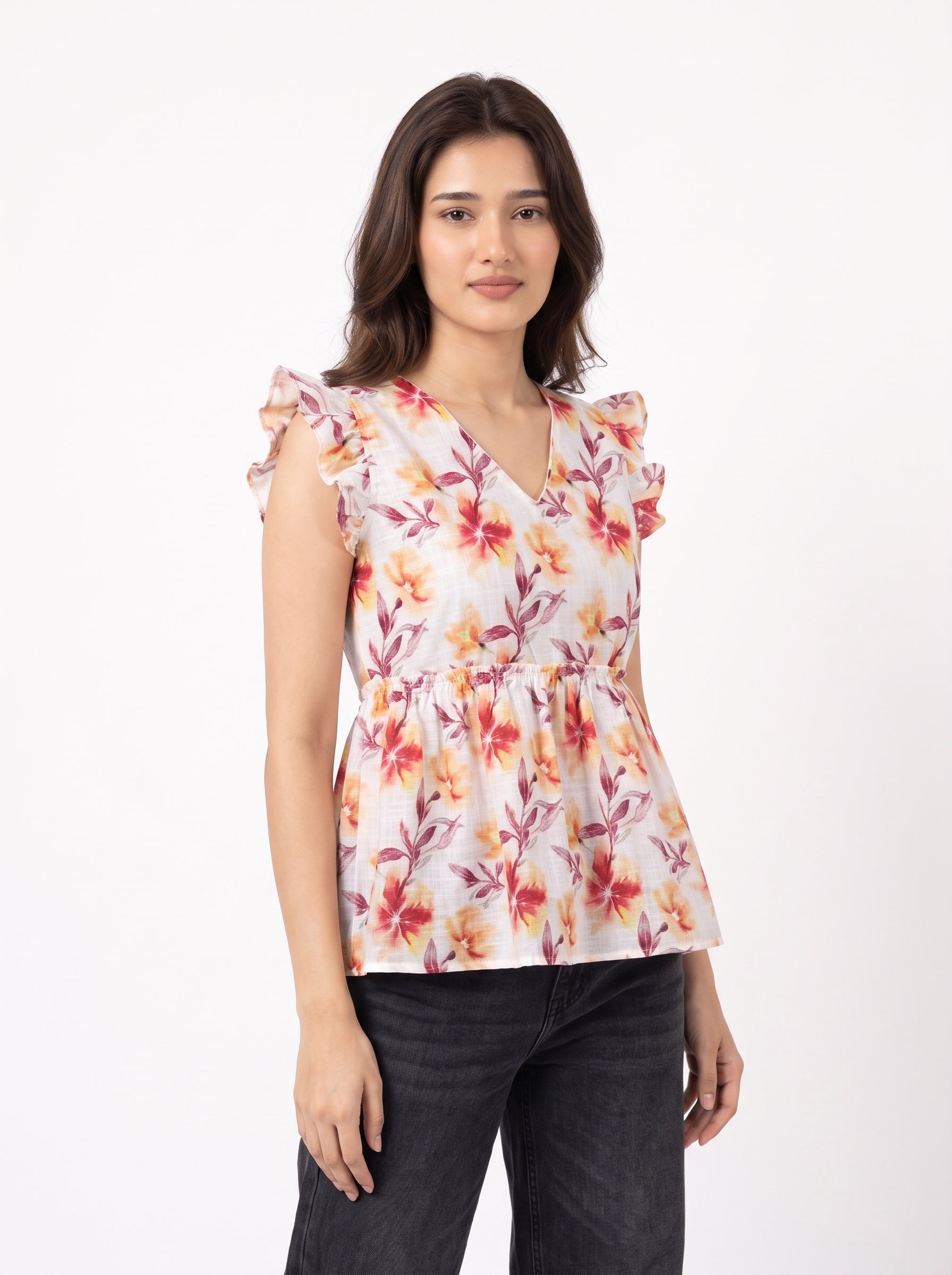 A fresh off-white top featuring rich rust, orange, and burgundy floral motifs for a warm feminine look.