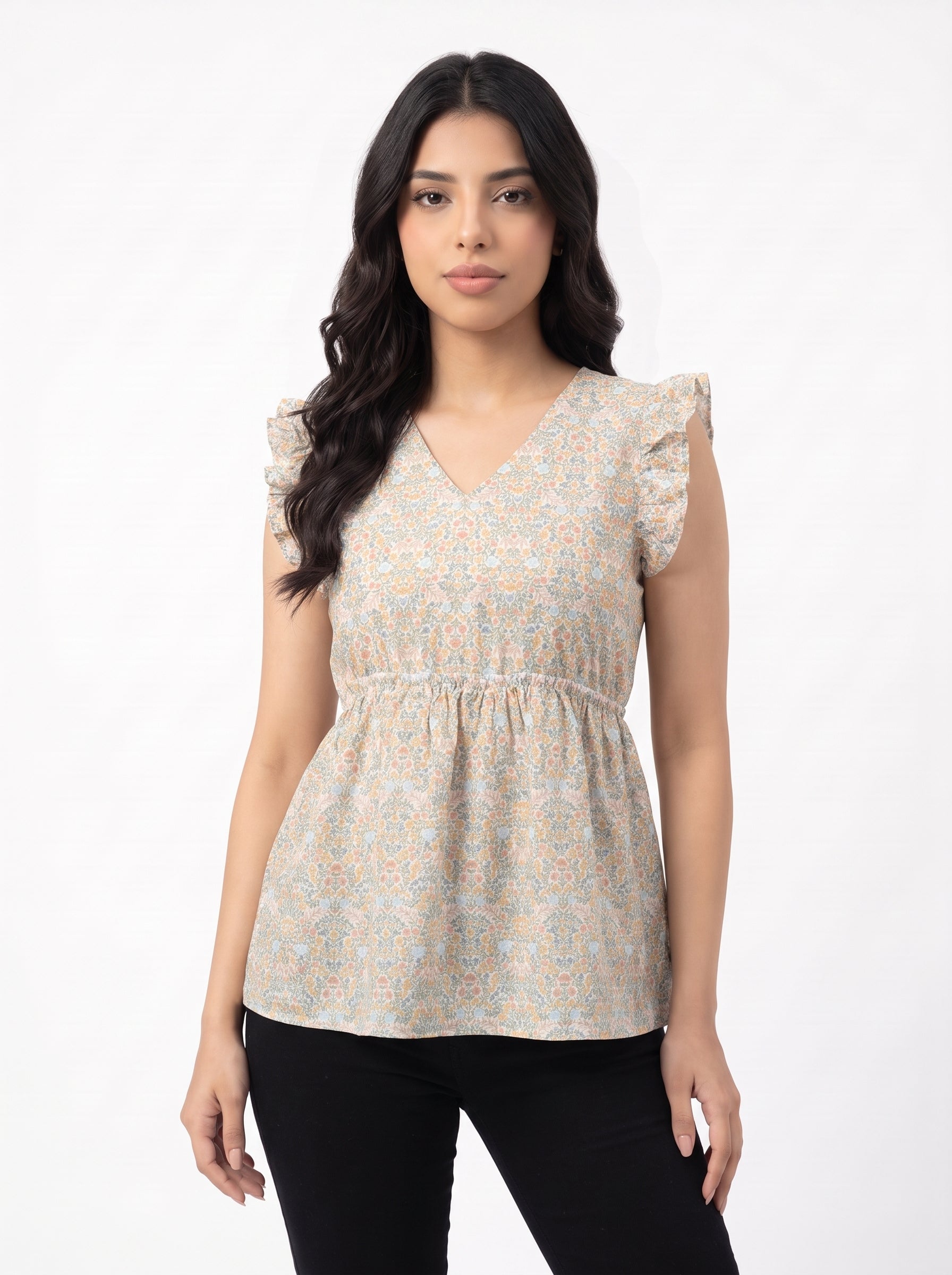 A soft off-white top featuring delicate peach and muted blue floral motifs for a fresh, feminine look.