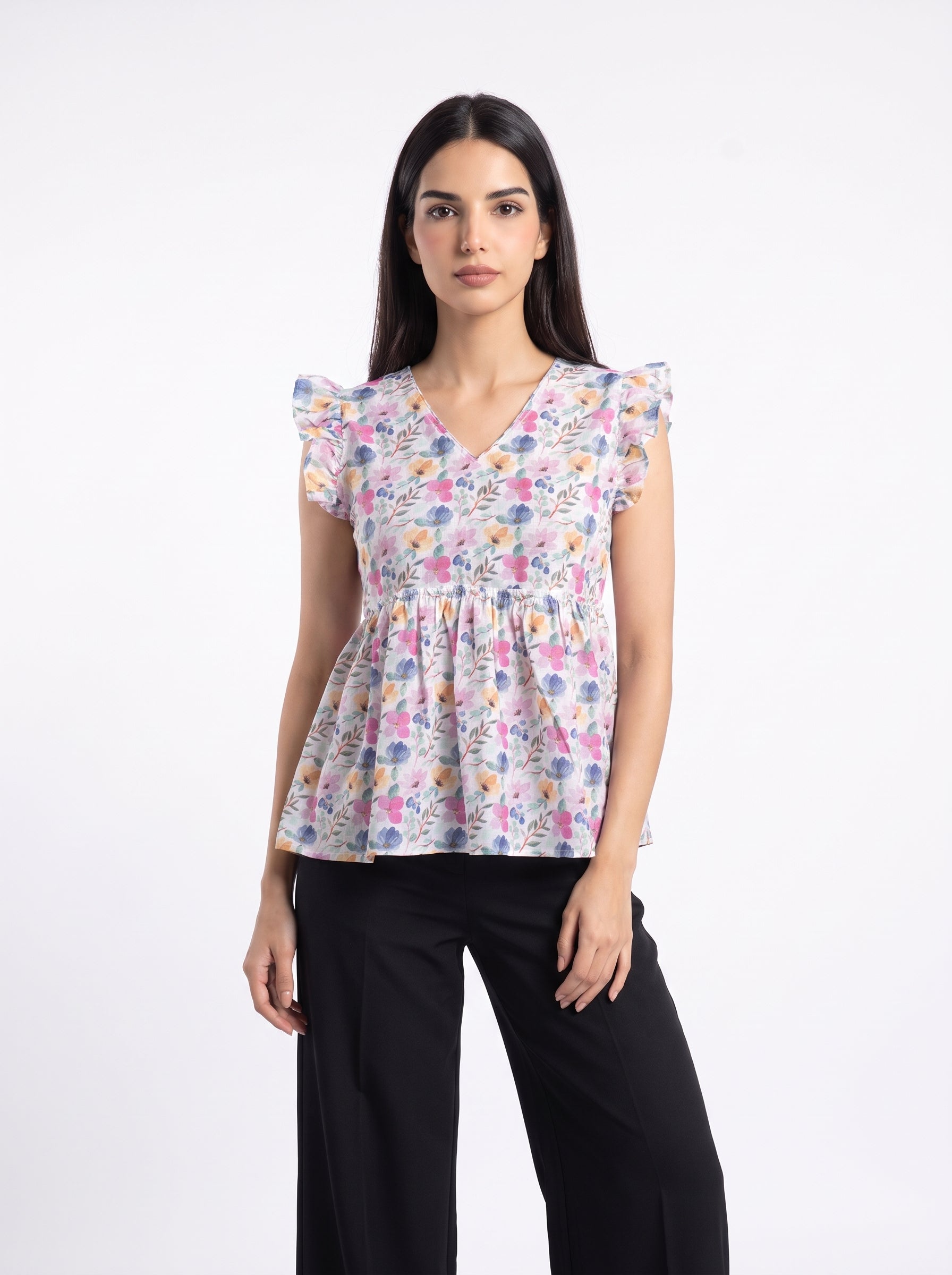 A fresh off-white top featuring soft pink, blue, peach, and green floral motifs for a bright feminine look.