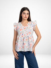 A fresh off-white top featuring soft peach florals with green and blue botanical accents for a charming feminine look.