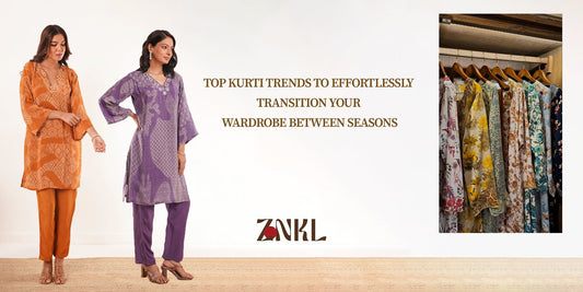 {Two women in stylish printed kurti sets in orange and purple, showcasing seasonal transition trends, with a wardrobe of floral kurtis in the background} - {ZNKL.IN}