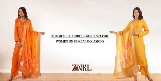 {Two women in luxurious orange and yellow kurti sets with embroidered dupattas, styled for special occasions} - {ZNKL.IN}