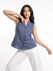 A smart dusty blue sleeveless top featuring a tailored lapel collar for a clean and contemporary look. 