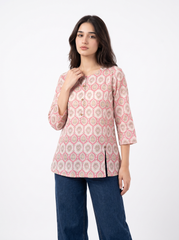 A stylish off-white top featuring soft pink ethnic-inspired motifs for a fresh everyday look.