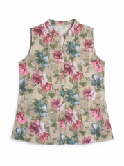 A sleeveless button-front vest with a beige base and a colorful floral print featuring pink, blue, and green flowers and leaves, displayed flat against a white background.