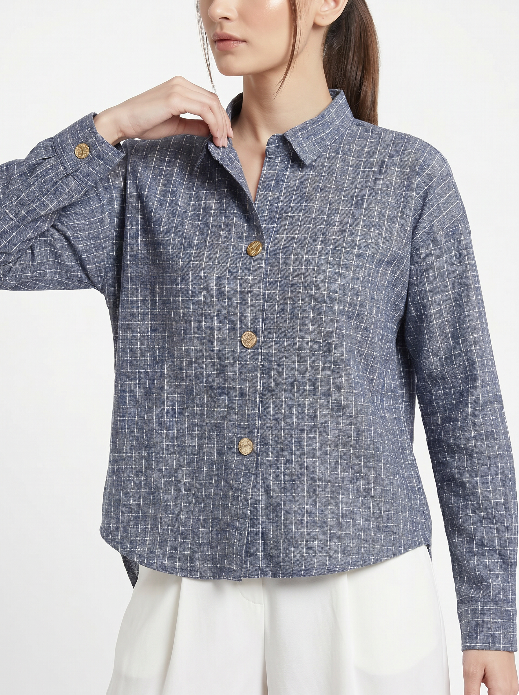 A refined slate blue shirt top featuring a fine white windowpane check for a clean and contemporary look