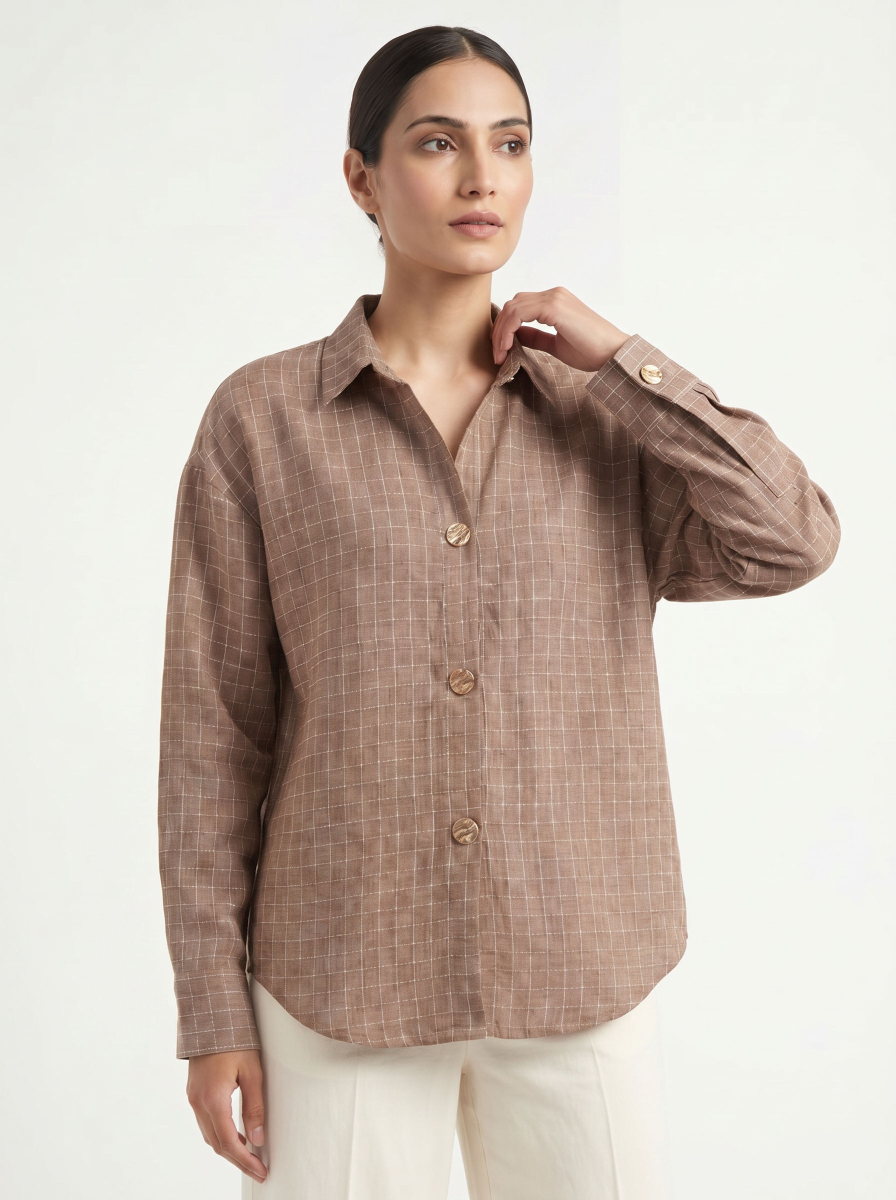 A refined mocha taupe shirt top featuring a subtle windowpane check pattern for a smart, modern look. The classic collar and gold-tone statement buttons add a polished touch, while the relaxed silhouette keeps it comfortable and easy to wear