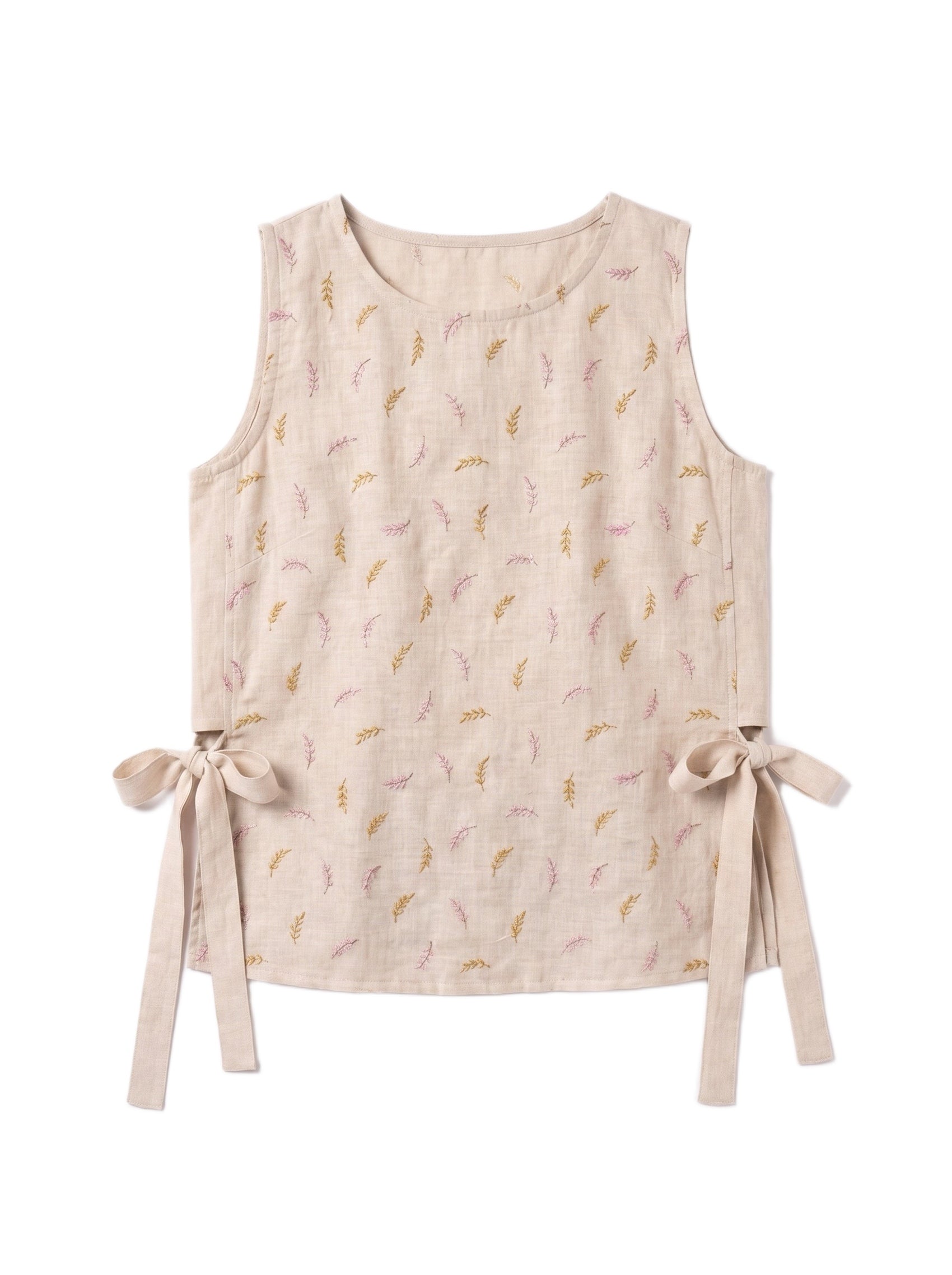 A sleeveless beige linen vest featuring a delicate pattern of small pink and gold leaves, with side tie details at the waist, shown against a plain white background.