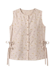 A sleeveless beige linen vest featuring a delicate yellow and pink leaf pattern, a button-up front, and side tie details, shown against a plain white background.