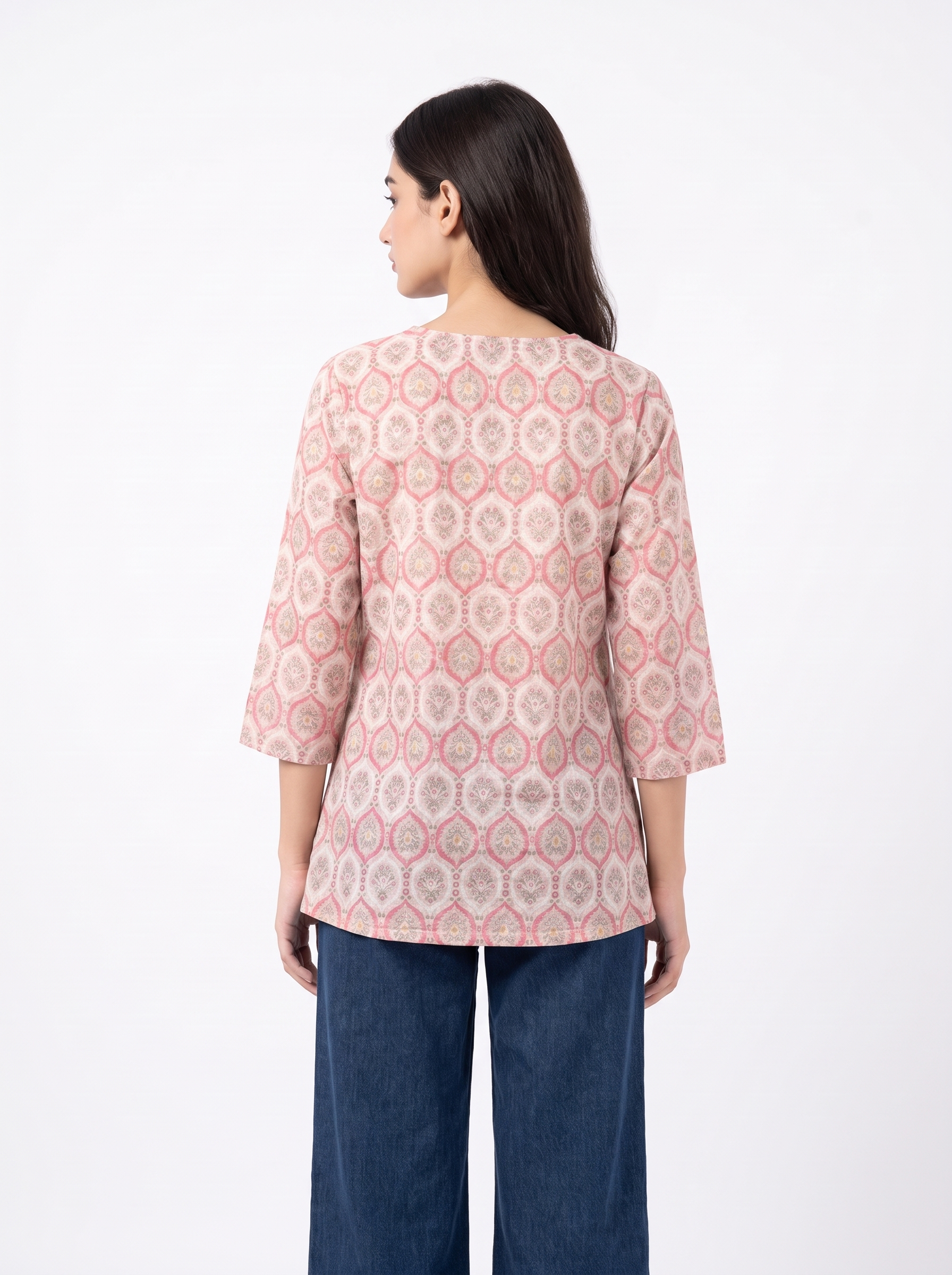 A stylish off-white top featuring soft pink ethnic-inspired motifs for a fresh everyday look