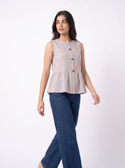 A woman modeling a sleeveless button-front peplum top with vertical stripes in beige, orange, and blue, paired with dark blue jeans, against a plain white studio background.