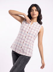 Add a clean and contemporary touch to your wardrobe with this soft blue and red checkered sleeveless top, featuring a neat split neckline and classic front button closure.