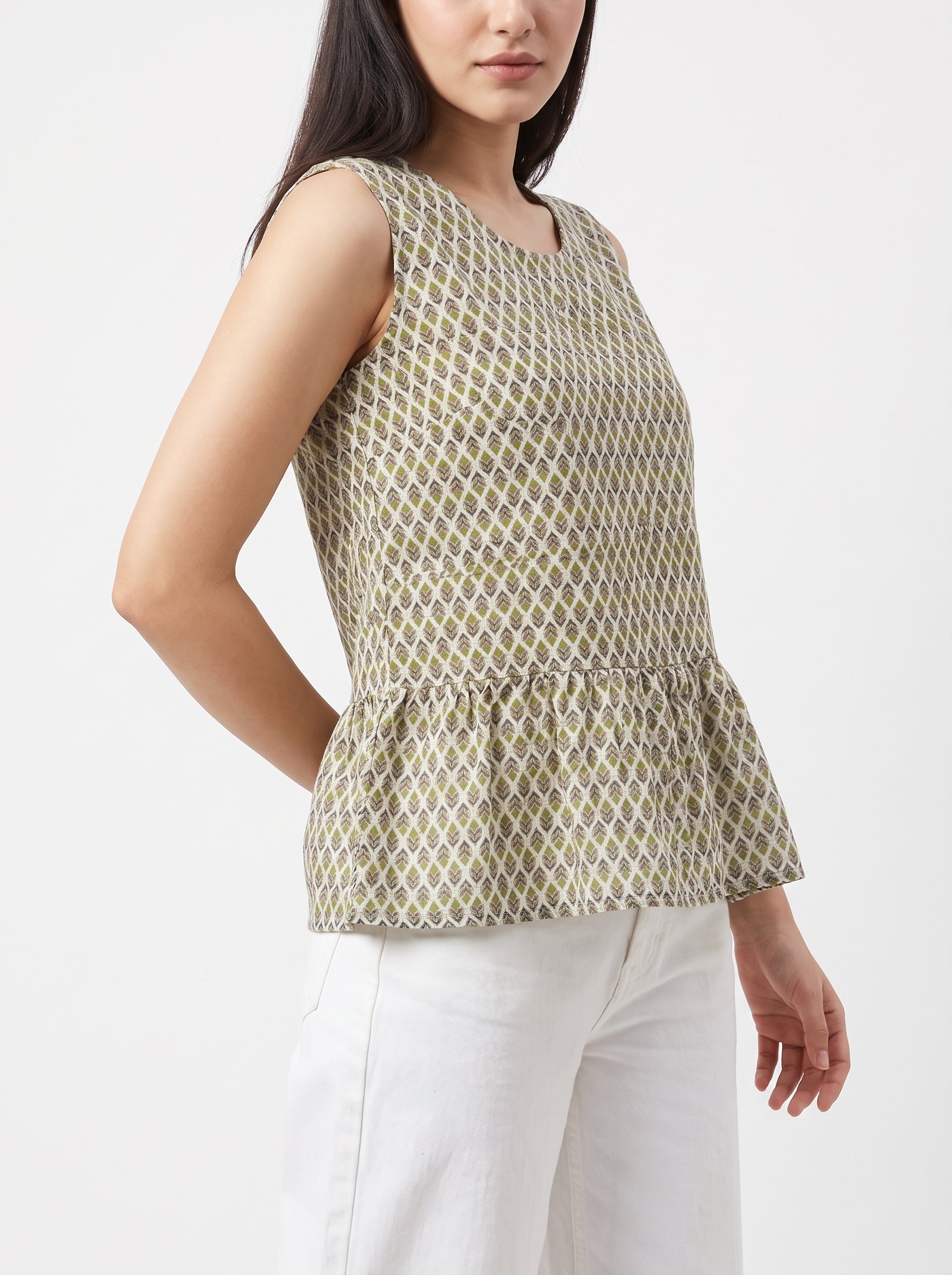 A stylish sleeveless top featuring a neat olive green and brown geometric print for a smart everyday look
