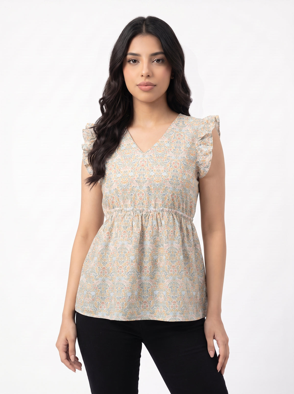 A soft off-white top featuring delicate peach and muted blue floral motifs for a fresh, feminine look.