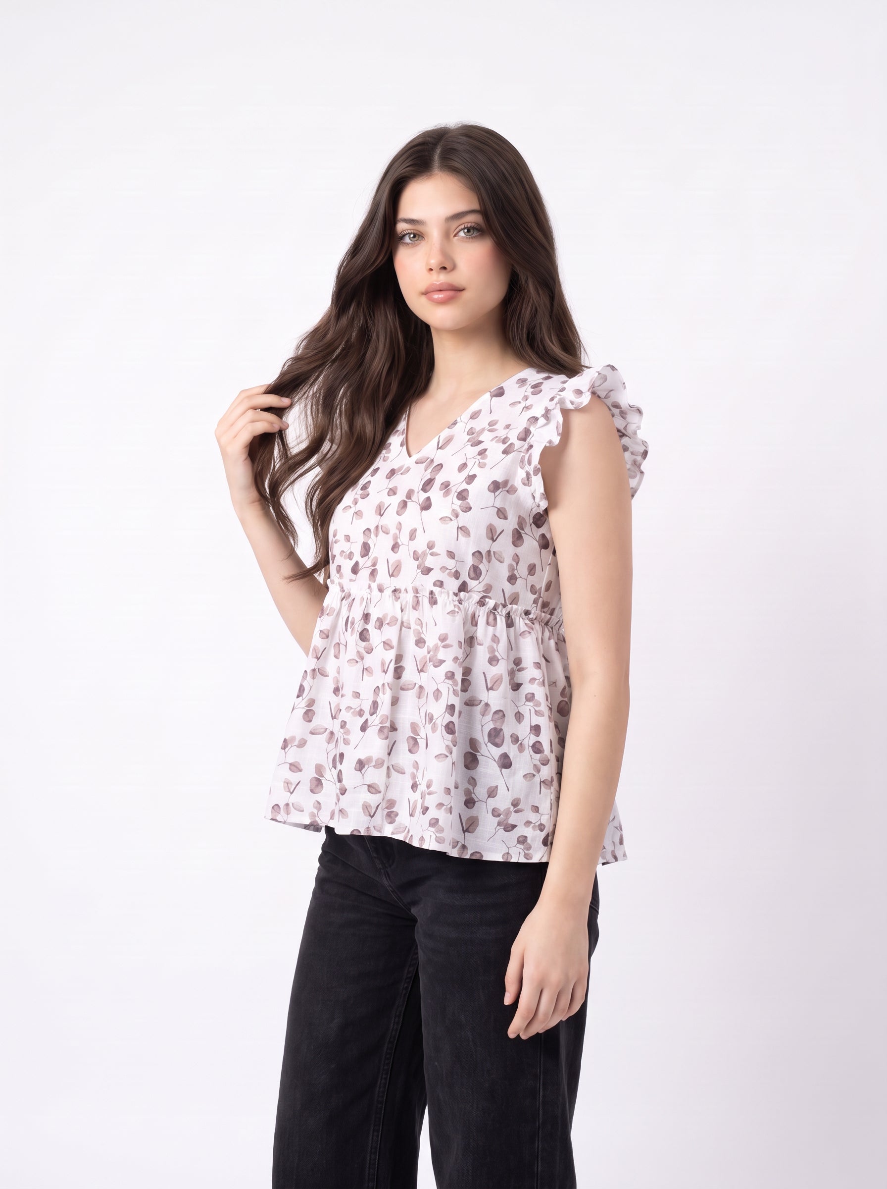 A soft off-white top featuring delicate mauve leaf motifs for a clean and feminine everyday look.