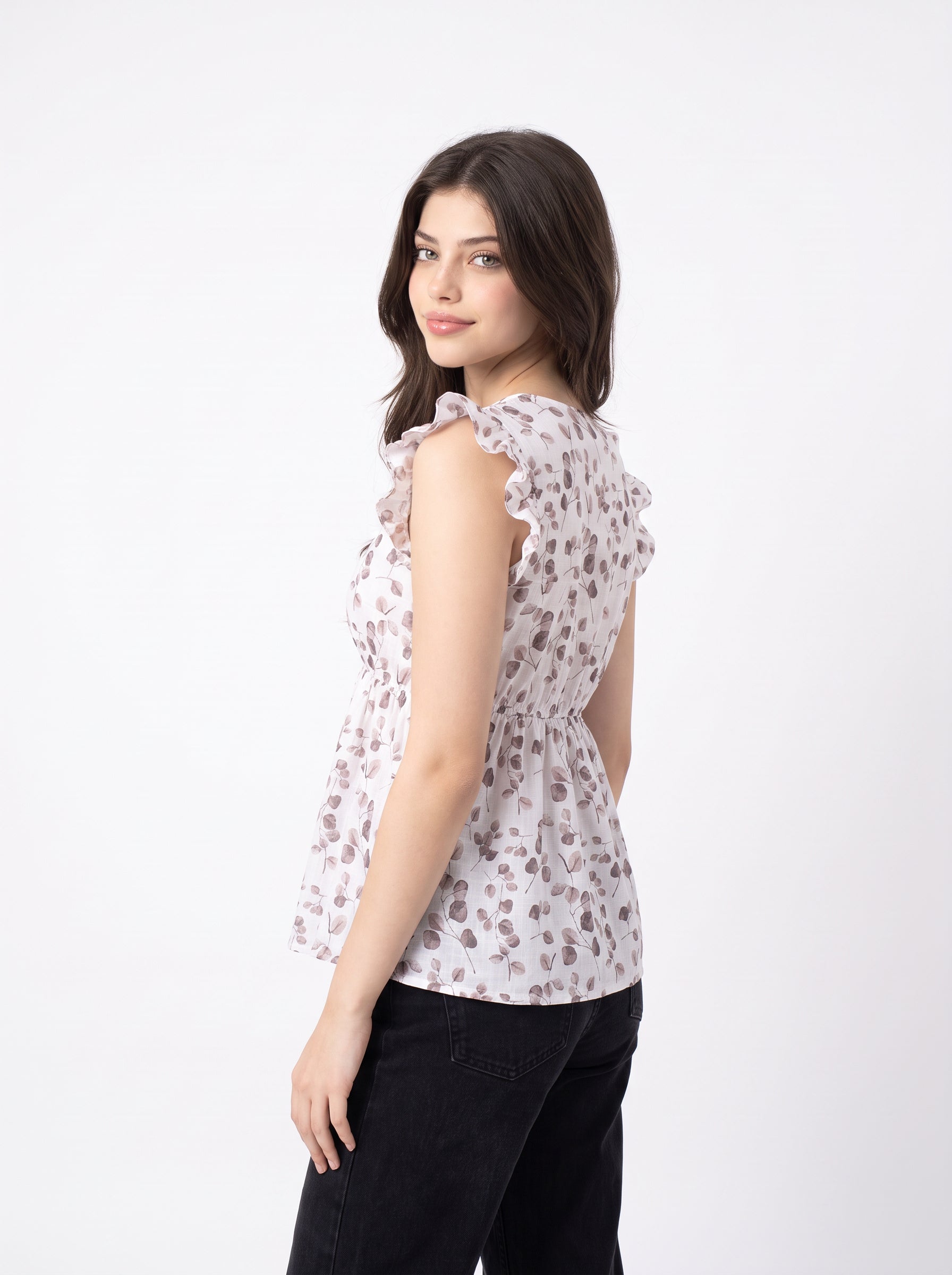 A soft off-white top featuring delicate mauve leaf motifs for a clean and feminine everyday look.
