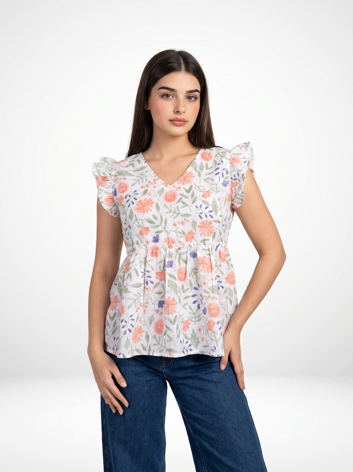 A fresh off-white top featuring soft peach florals with green and blue botanical accents for a charming feminine look. 