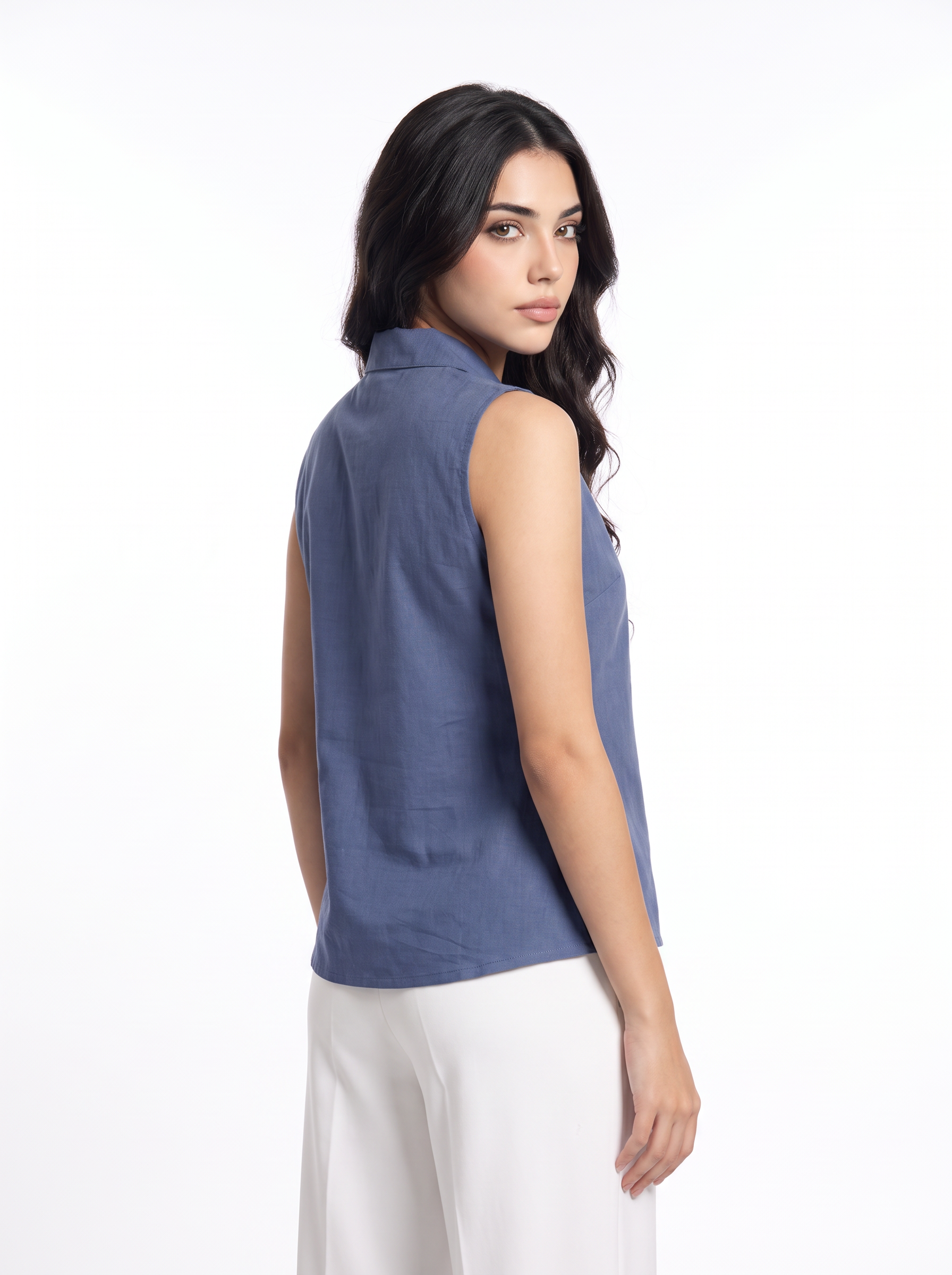 A smart dusty blue sleeveless top featuring a tailored lapel collar for a clean and contemporary look. 